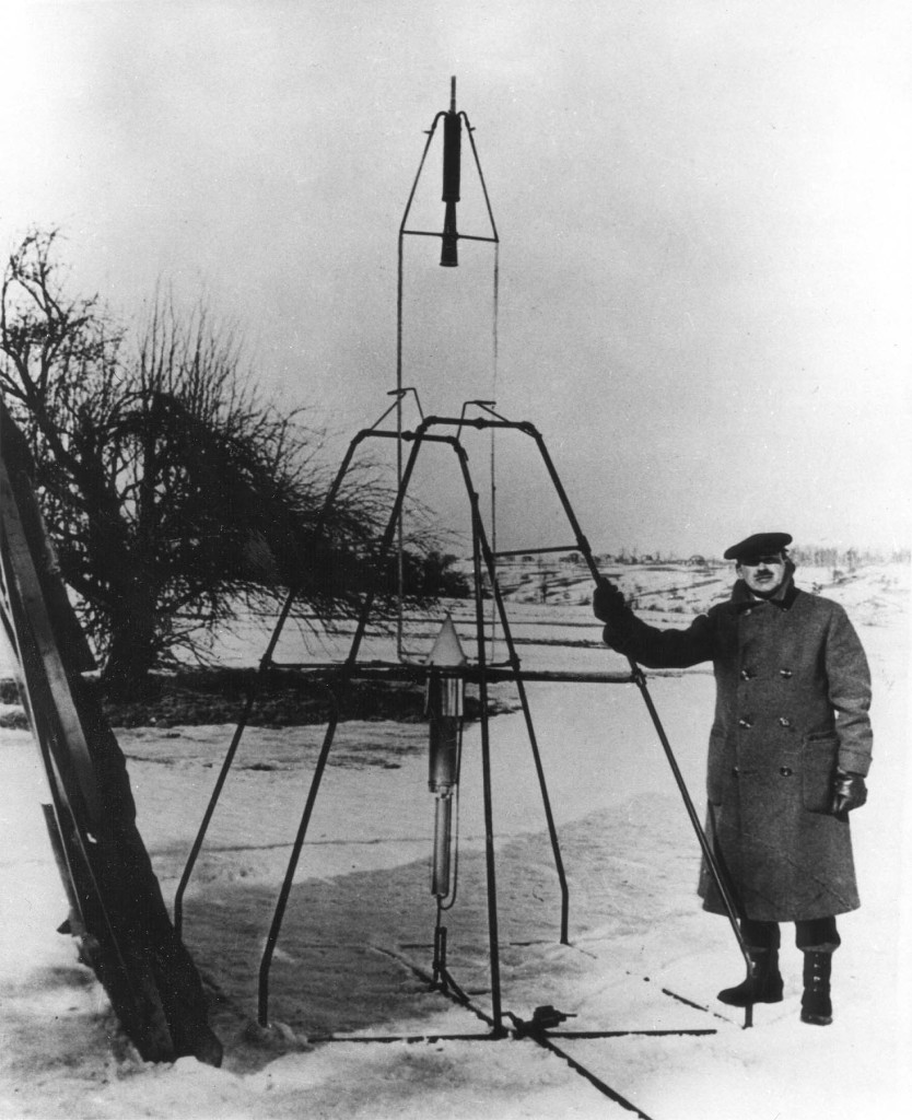 Robert H. Goddard next to his liquid fueled rocket in 1926.