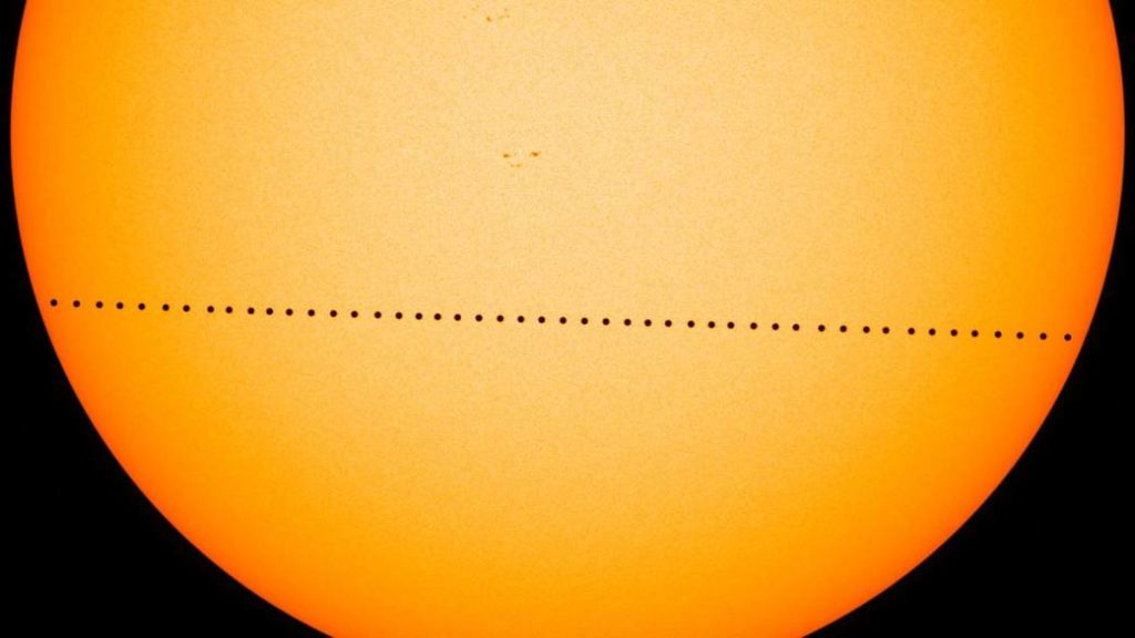The image depicts the seven-and-a-half hour long journey taken by Mercury in front of the Sun, as seen from Earth.